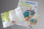 Flyer erklärt den Flüchtlingen Nikolaus